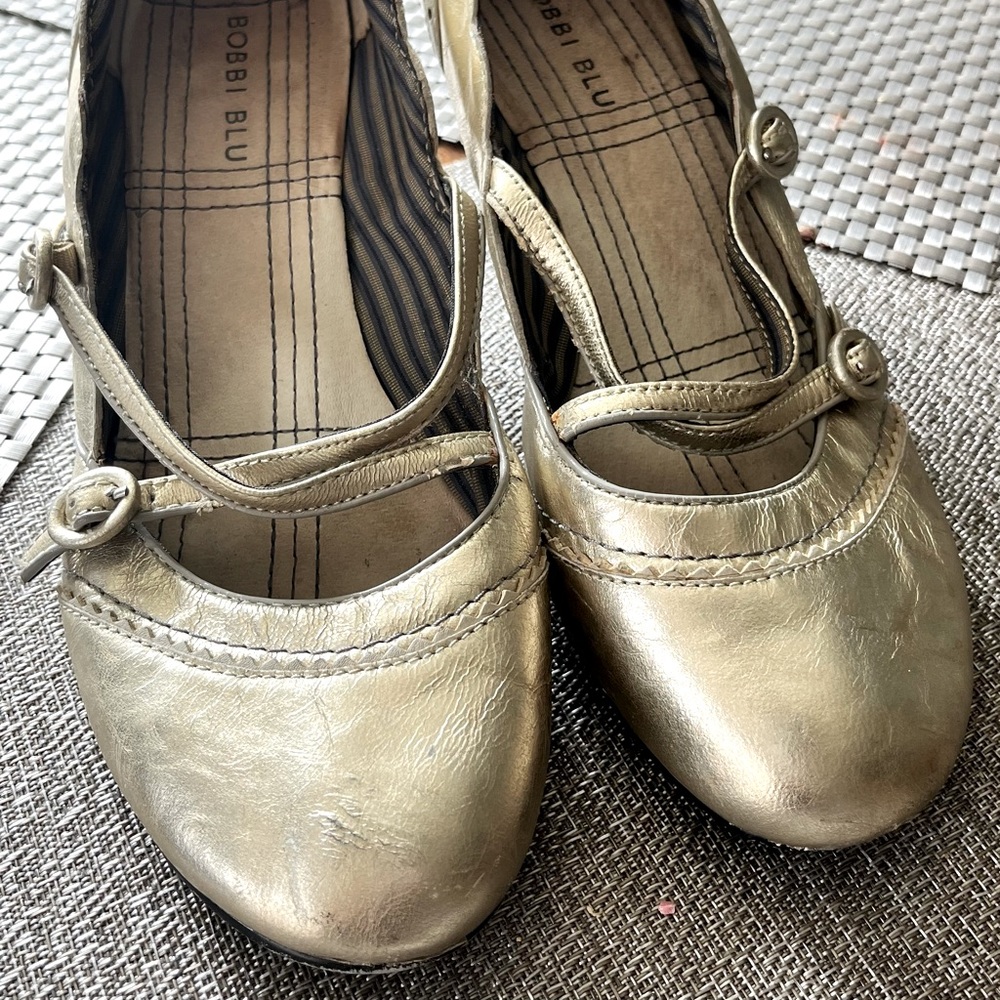 Gold, vintage looking heels. Worn but cute.
